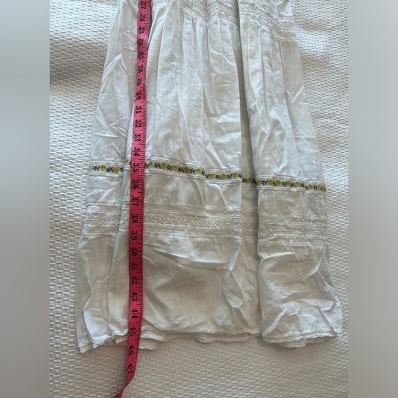 THE GREAT. The Clover Smocking Sleeveless Embroidered Floral Mid Dress - Picture 12 of 16